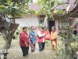 Bupati Batu Bara Melalui Dinsos PPPA Berikan Bantuan Kepada Masyarakat Terdampak Banjir