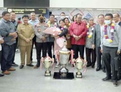 Kapoldasu Sambut Kedatangan Kontingen Pesparawi Sumut di Bandara Kualanamu