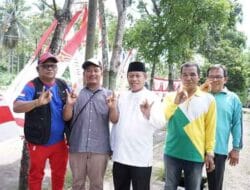 Plt Walikota Tanjung Balai Bagikan Bendera Merah Putih untuk Masyarakat