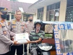 Kapolsek Stabat Laksanakan Pembagian Bansos Dampak Kenaikan BBM