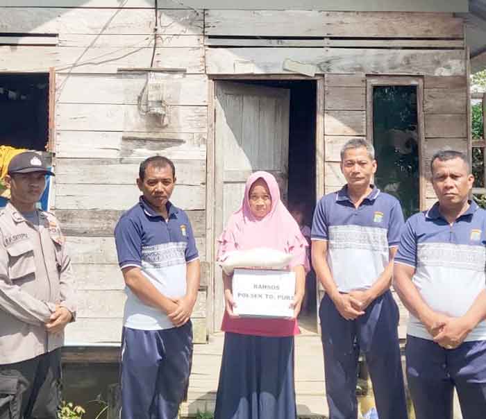 Kapolsek Tanjung Pura Baksos Kepada Masyarakat Terdampak Kenaikan BBM