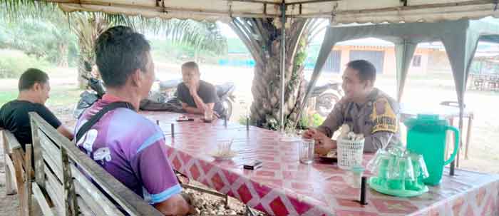 Bhabinkamtibmas Polsek Pangkalan Susu Laksanakan Sambang Desa & Pesan Kamtibmas