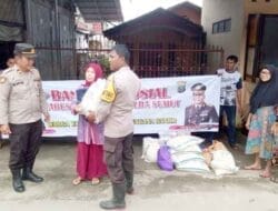 Pembagian Bansos dari Kapolri dan Kapoldasu di Kecamatan Tanjung Pura Kepada Warga Korban Banjir