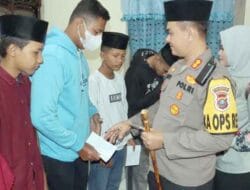 Kapolres dan Ketua Bhayangkari PC Langkat Berikan Santunan Anak Yatim Piatu