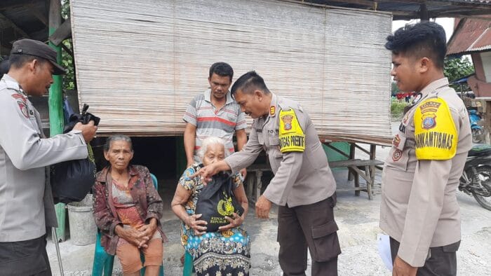 Polres Samosir Redakan Suhu Politik Pilkada 2024 Lewat Bakti Sosial