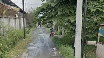 Jalan Balai Desa dan Gereja Desa Helvetia Bagai Kubangan Kerbau