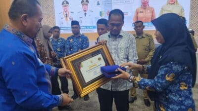 Bupati Batu Bara Serahkan 116.076 SPPT PBB-P2