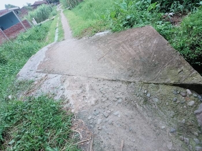 Pembangunan Tembok Penahan Tanah dan Pembuatan Saluran Air di TPU Dusun lV Terealisasi 