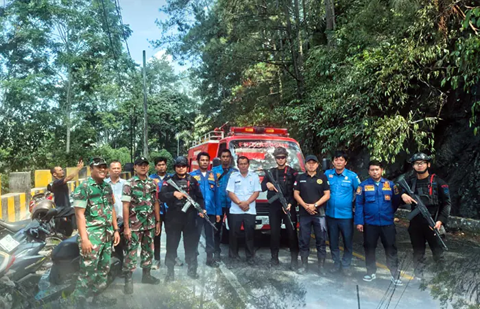 Sigap di Tengah Karhutla, Brimob Sumut Amankan Jalur Lintas Siborongborong–Parapat