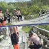 Perkuat Infrastruktur Desa, Brimob Sumut Lakukan Perbaikan Jembatan Gotting