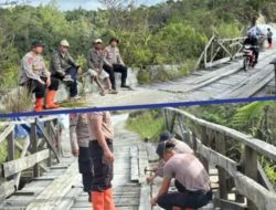 Perkuat Infrastruktur Desa, Brimob Sumut Lakukan Perbaikan Jembatan Gotting